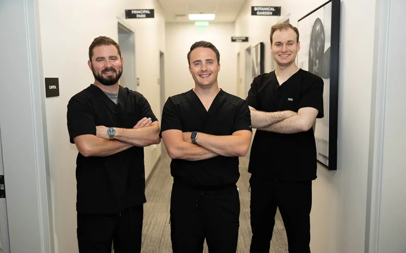 Modern Vision Centers surgeons standing in the clinic hallway